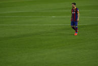 Barcelona's Lionel Messi walks during the Spanish La Liga soccer match between FC Barcelona and Sevilla FC at the Camp Nou stadium in Barcelona, Spain, Sunday, Oct. 4, 2020. (AP Photo/Joan Monfort)