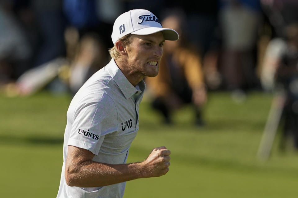 Will Zalatoris celebrates after a par save on the 18th hole during the final round of the PGA Championship golf tournament at Southern Hills Country Club, Sunday, May 22, 2022, in Tulsa, Okla. (AP Photo/Matt York)