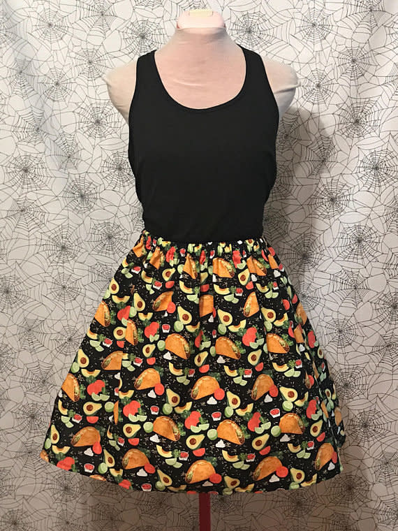 <a href="https://www.etsy.com/listing/545683164/taco-skirt-taco-tuesday-avocado-skirt-i?ga_order=most_relevant&amp;ga_search_type=all&amp;ga_view_type=gallery&amp;ga_search_query=tacos&amp;ref=sr_gallery_6" target="_blank">Shop it here</a>.&nbsp;