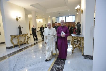 Pope Francis meets the Archbishop of Canterbury Justin Welby at the end of a two day Spiritual retreat with South Sudan leaders at the Vatican, April 11, 2019. Vatican Media/­Handout via REUTERS