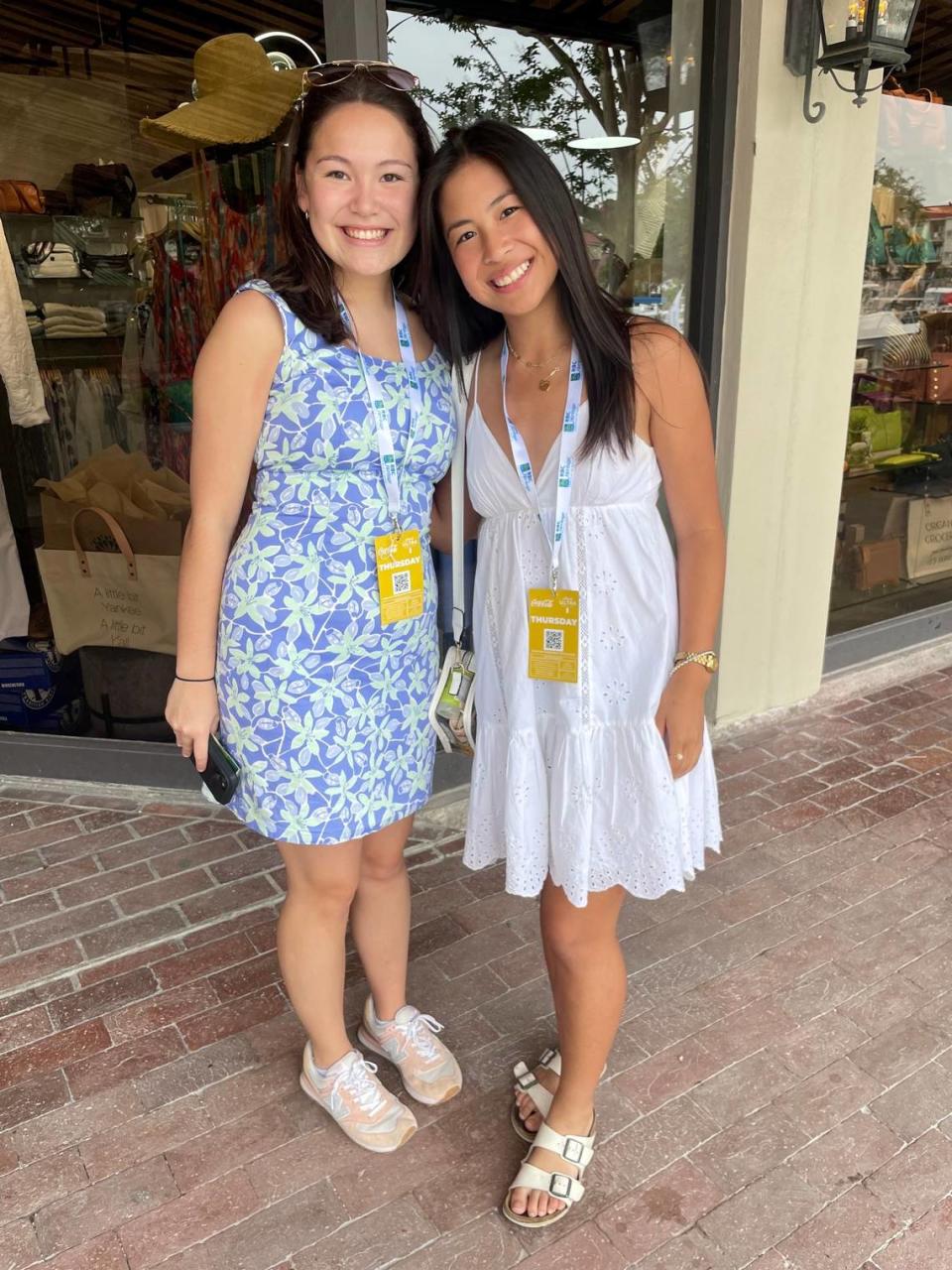 Kiwa Bertholf and Meagan Alvarez pose for a picture during the 2023 RBC Heritage golf tournament outside of Radiance boutique in Harbour Town.
