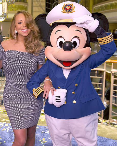 Mariah Carey with Mickey Mouse in 2012