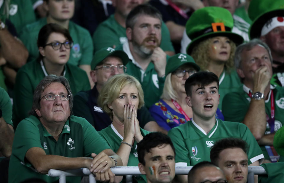Irish fans react as they watch the Rugby World Cup Pool A game at Shizuoka Stadium Ecopa between Japan and Ireland in Shizuoka, Japan, Saturday, Sept. 28, 2019. (AP Photo/Jae Hong)