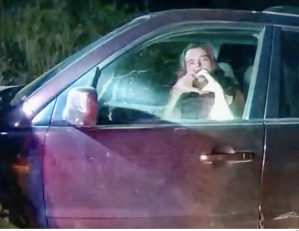 Christian Glass making heart signs to police on the night he was killed (CCSO)