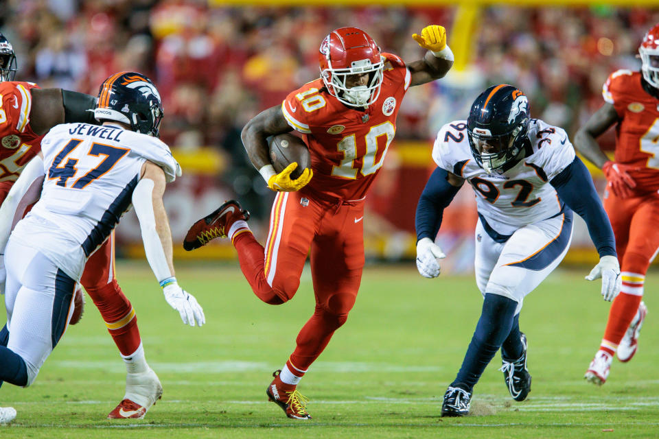 Oct 12, 2023; Kansas City, Missouri, USA; Kansas City Chiefs running back <a class="link " href="https://sports.yahoo.com/nfl/players/34207" data-i13n="sec:content-canvas;subsec:anchor_text;elm:context_link" data-ylk="slk:Isiah Pacheco;sec:content-canvas;subsec:anchor_text;elm:context_link;itc:0">Isiah Pacheco</a> (10) dodges tackles during the second quarter against the Denver Broncos at GEHA Field at Arrowhead Stadium. Mandatory Credit: William Purnell-USA TODAY Sports