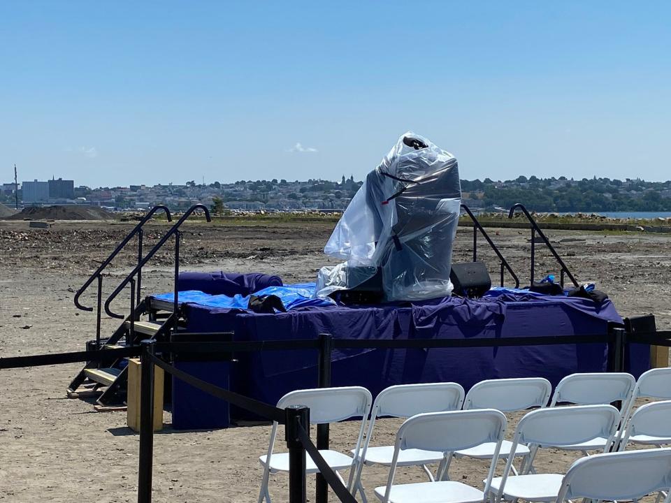 The presidential lectern is wrapped in plastic before the arrival of President Joe Biden at Brayton Point in Somerset on July 22, 2022.