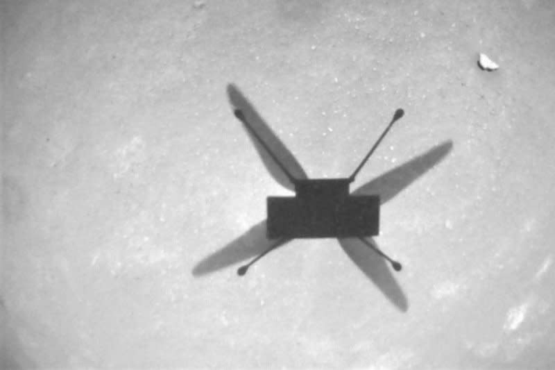 NASA's Ingenuity Mars Helicopter photographed its shadow during the aircraft's 15th Flight on November 6, 2021.  The plane suffered rotor damage and was on its final flight, NASA said Thursday.  Photo courtesy of NASA