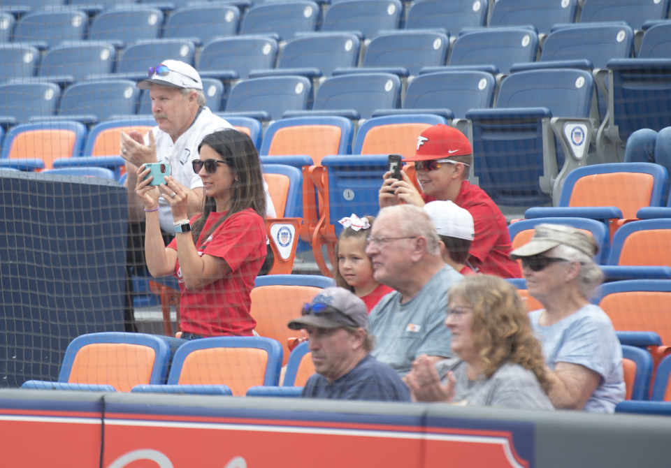 Division II Coach of the Year Field's Joe Peterson's family watch him collect the award prior to All-Star game at Canal Park in Akron on Wednesday, June 28.