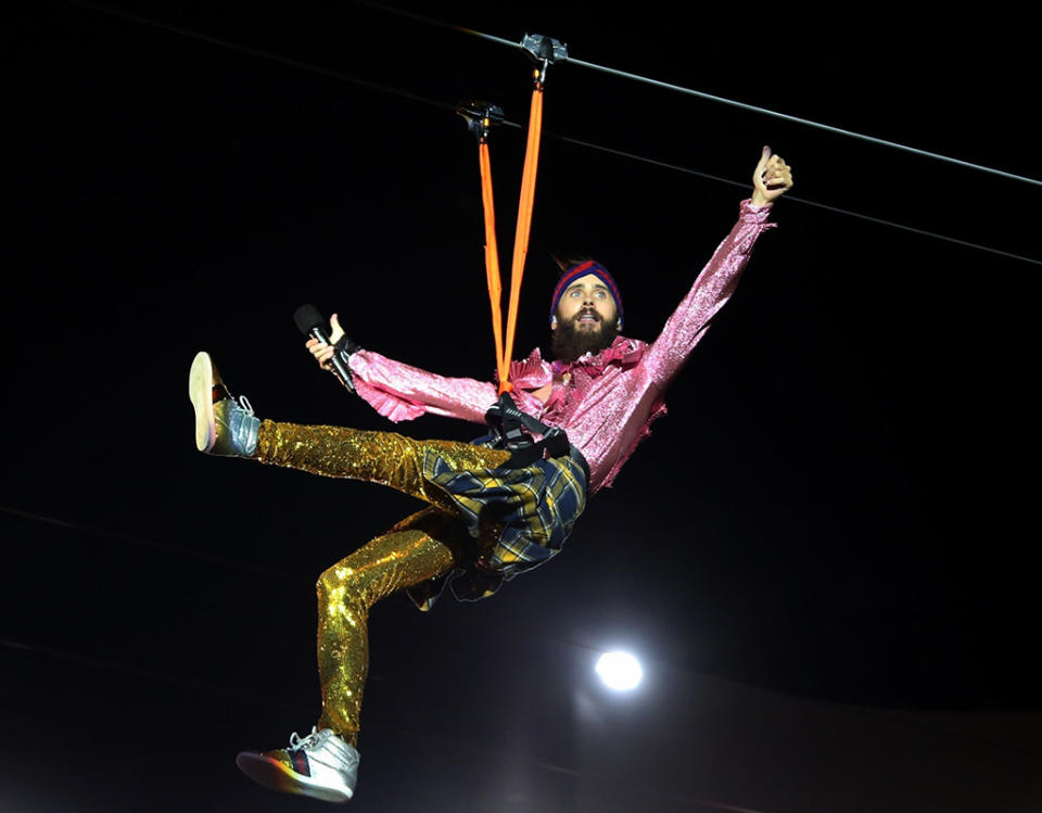 <p>It’s a bird! It’s a plane! It’s… Jared Leto? The singer-slash-actor started his performance with his band, Thirty Seconds to Mars, by ziplining to the stage at the Rock in Rio music festival in Brazil. (Photo: GADE/Backgrid) </p>