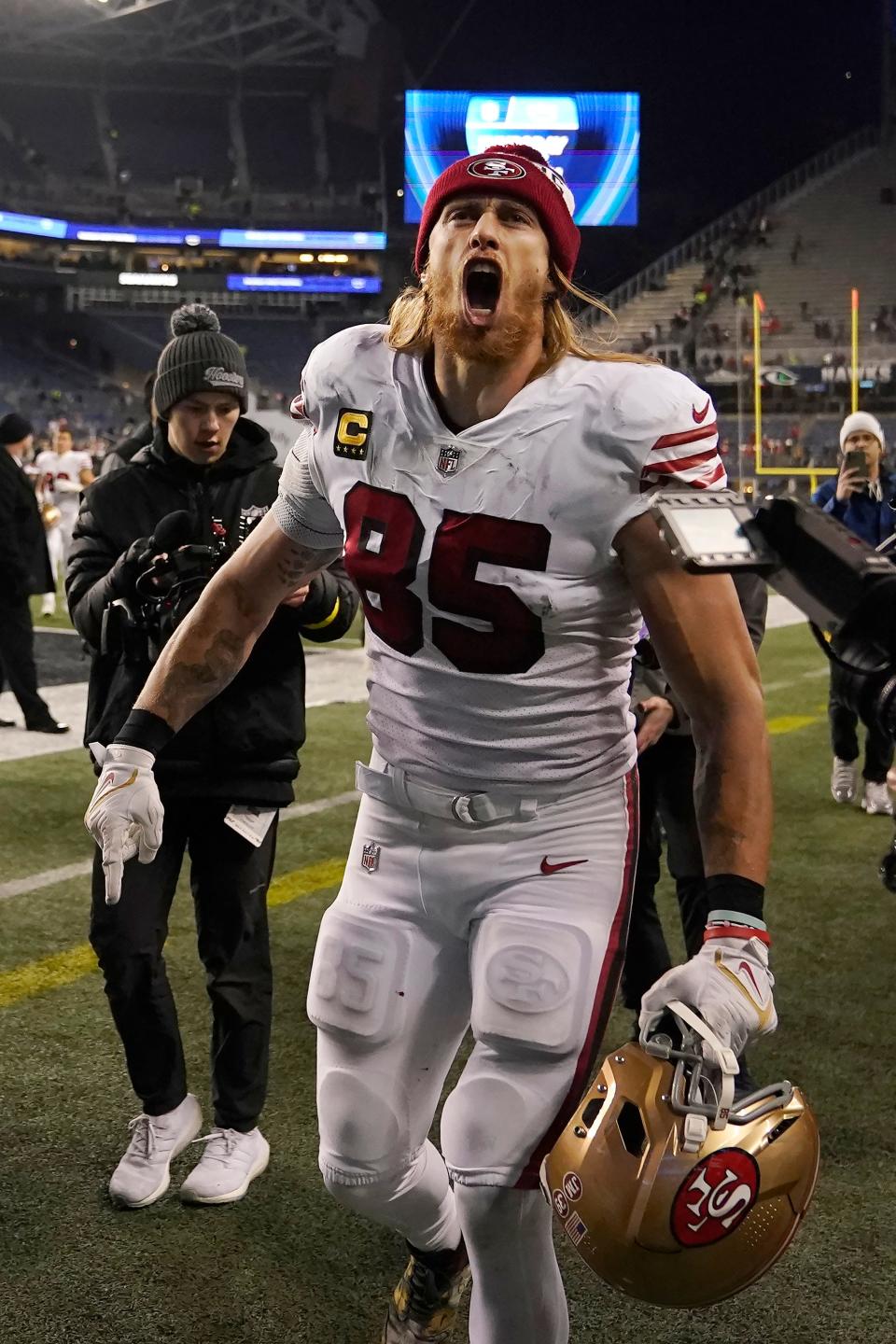 George Kittle celebrates after the 49ers defeated the Seahawks.