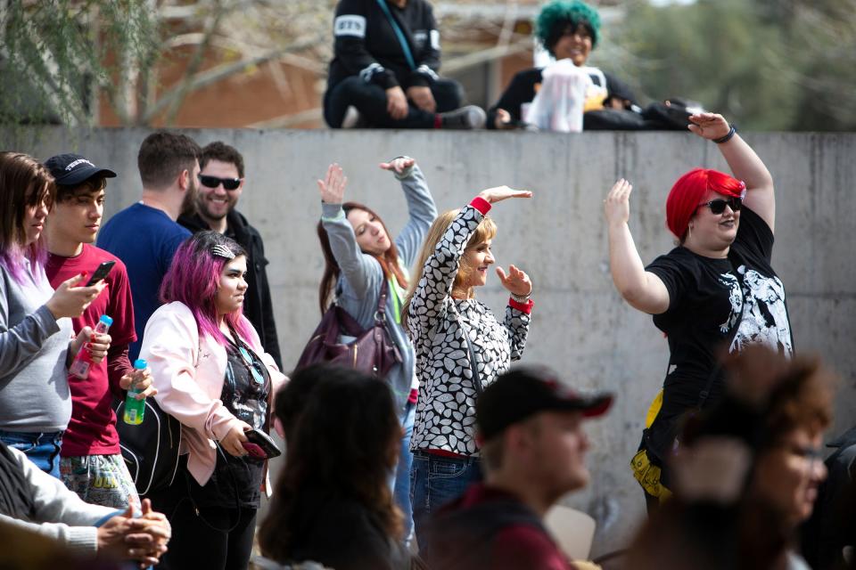 The crowd dances along as a Japanese singer performs "YMCA" during the Matsuri Festival of Japan at Heritage and Science Park on Sunday, Feb. 24, 2019.