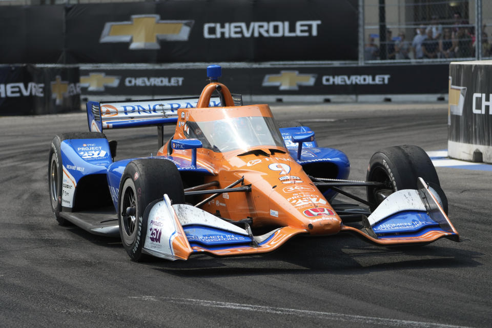 Scott Dixon makes a turn during the IndyCar Detroit Grand Prix auto race in Detroit, Sunday, June 4, 2023. (AP Photo/Paul Sancya)