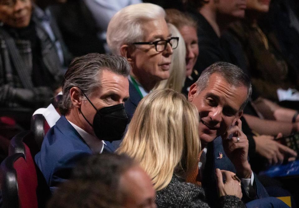 Gov. Gavin Newsom, left, former governor Gray Davis and outgoing mayor Eric Garcetti