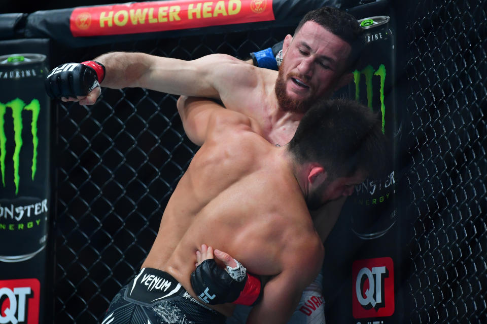 Feb 17, 2024; Anaheim, California, USA; Merab Dvalishvili lands a hit against Henry Cejudo during UFC 298 at Honda Center. Mandatory Credit: Gary A. Vasquez-USA TODAY Sports