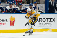 Nashville Predators' Kiefer Sherwood skates with the puck during the first period of the team's NHL hockey game against the New York Islanders in Elmont, N.Y., Saturday, April 6, 2024. (AP Photo/Peter K. Afriyie)
