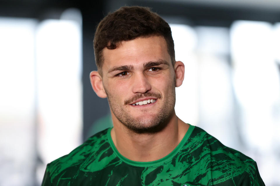 Pictured here, halfback Nathan Cleary speaks to reporters during a media conference for Australia at the Rugby League World Cup.