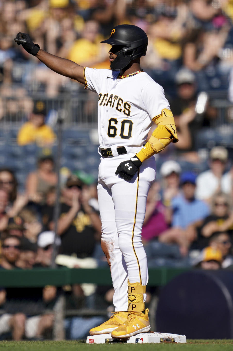 Pittsburgh Pirates' Liover Peguero reacts after hitting a triple against the Miami Marlins during the second inning of a baseball game in Pittsburgh, Sunday, Oct. 1, 2023. (AP Photo/Matt Freed)