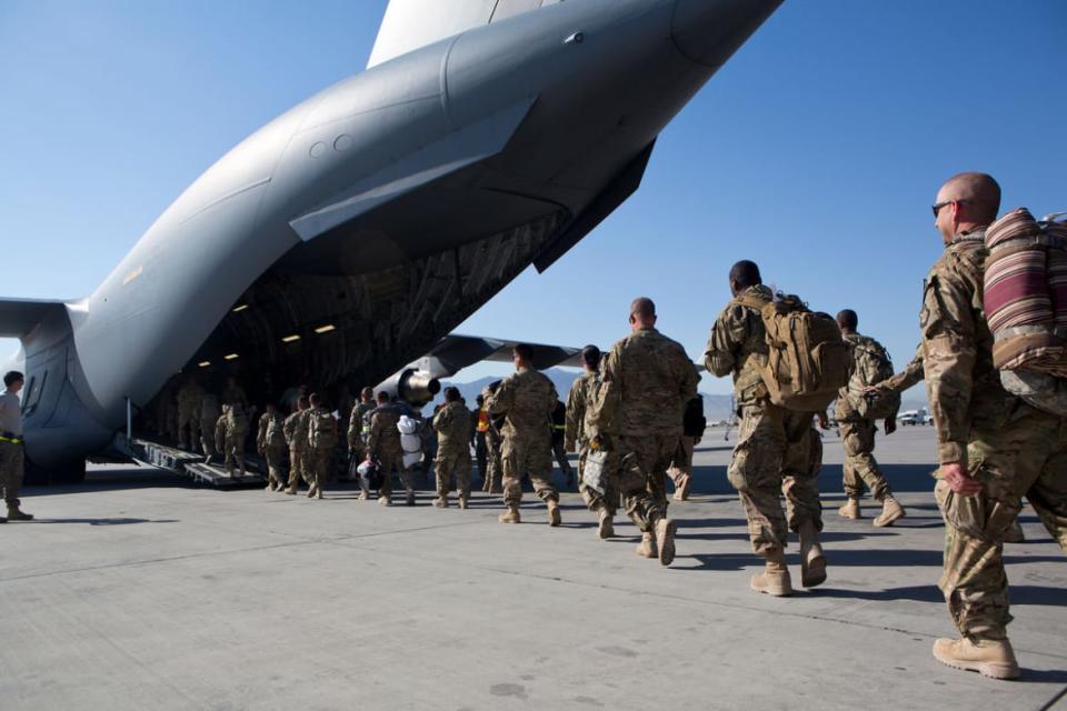 <div class="inline-image__caption"><p>U.S. Army soldiers walk to their C-17 cargo plane for departure May 11, 2013 at Bagram Air Base, Afghanistan. U.S. soldiers and marines are part of the NATO troop withdrawal from Afghanistan, to be completed by the end of 2014.</p></div> <div class="inline-image__credit">Robert Nickelsberg/Getty Images</div>