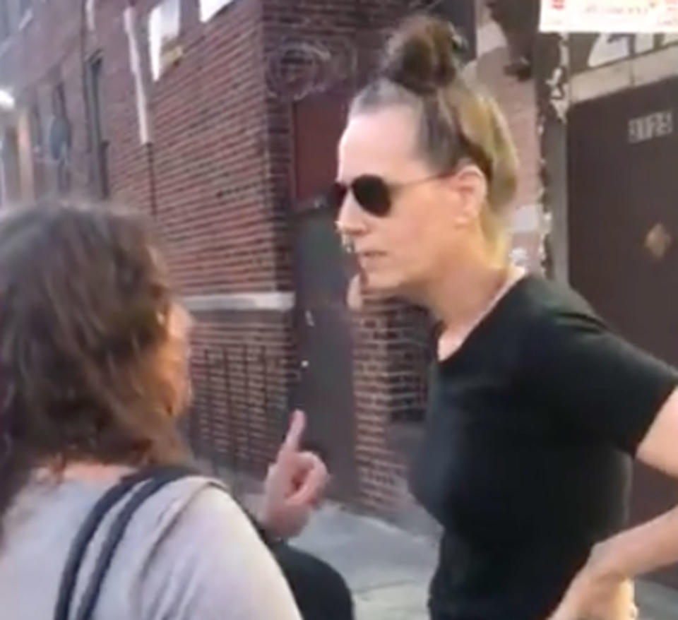 A passerby confronts the woman who’s been dubbed ‘Cornerstore Caroline’. Source: Facebook/Jason Stovetop Littlejohn