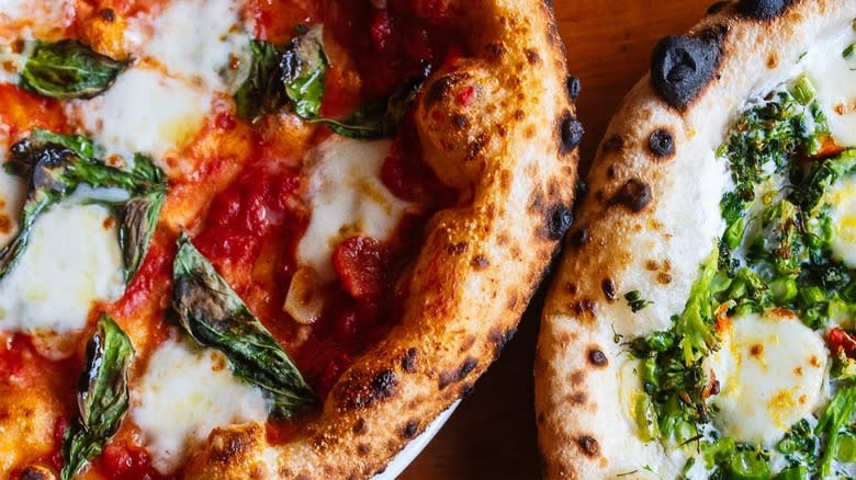 Margherita and broccolini pizzas at Louie