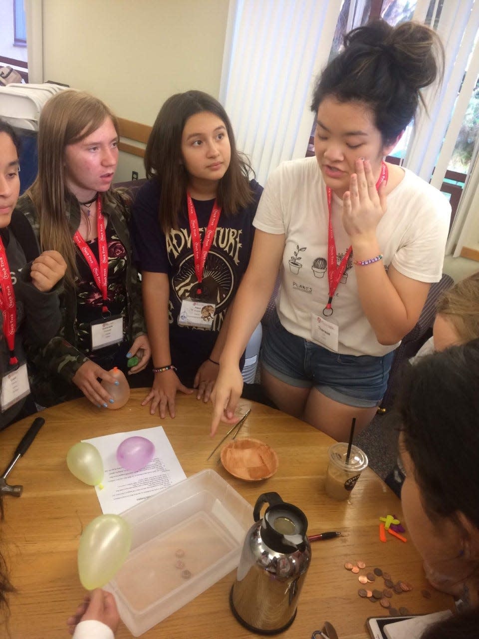 Alexa Duque, center, watches her Tech Trek instructor at UC Irvine in 2018. Duque is now a high school senior.