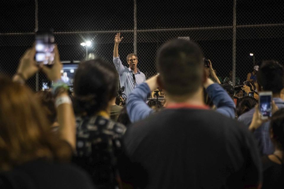 Democratic presidential candidate Beto O'Rourke addresses people during a vigil Sunday, Aug. 4, 2019, at Ponder Park in honor to the victims of a mass shooting occurred in Walmart on Saturday, Aug. 3, 2019, in El Paso, Texas. (Lola Gomez/Austin American-Statesman via AP)