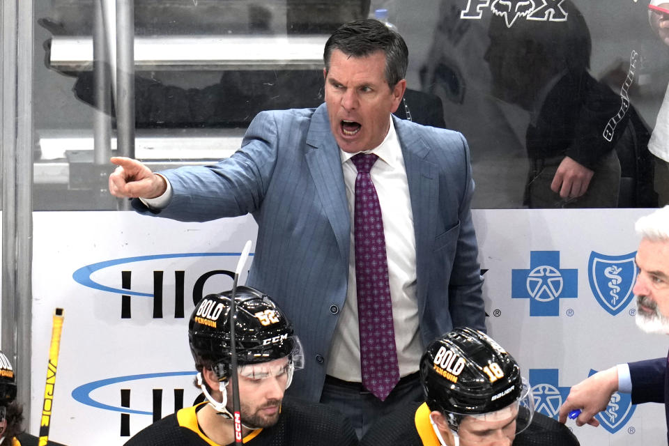 Pittsburgh Penguins head coach Mike Sullivan shouts instructions during the third period of an NHL hockey game against the Tampa Bay Lightning in Pittsburgh, Saturday, April 6, 2024. The Penguins won 5-4. (AP Photo/Gene J. Puskar)