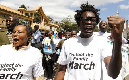 Members of the anti-gay caucus chant slogans against the lesbian, gay, bisexual, and transgender (LGBT) community as they march along the streets in Kenya's capital Nairobi July 6, 2015. REUTERS/Thomas Mukoya