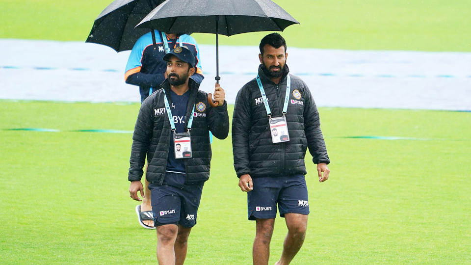 Ajiknya Rahane and Cheteshwar Pujara, pictured here walking off the field.