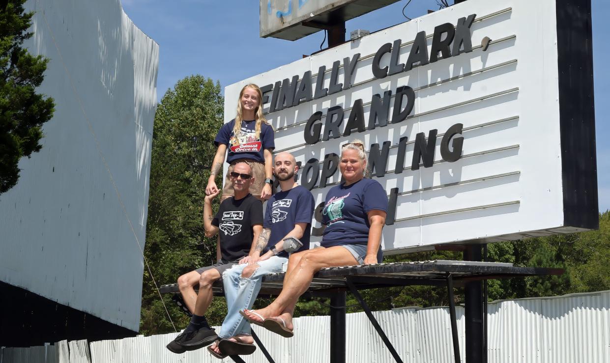 The Pentecost family, Casey, Roger, Lane and Melinda, pose on their sign in this Gazette file photo.