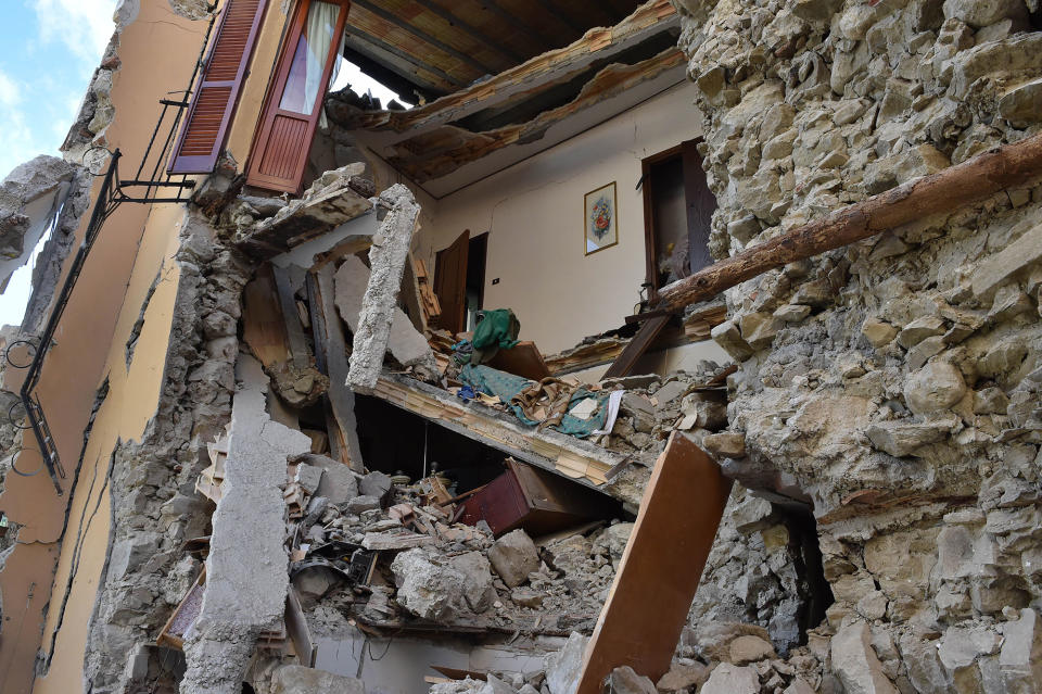 <p>View of buildings damaged by the earthquake on August 24, 2016 in Arquata del Tronto, Italy. Central Italy was struck by a powerful, 6.2-magnitude earthquake in the early hours, which has killed at least thirteen people and devastated dozens of mountain villages. (Giuseppe Bellini/Getty Images) </p>