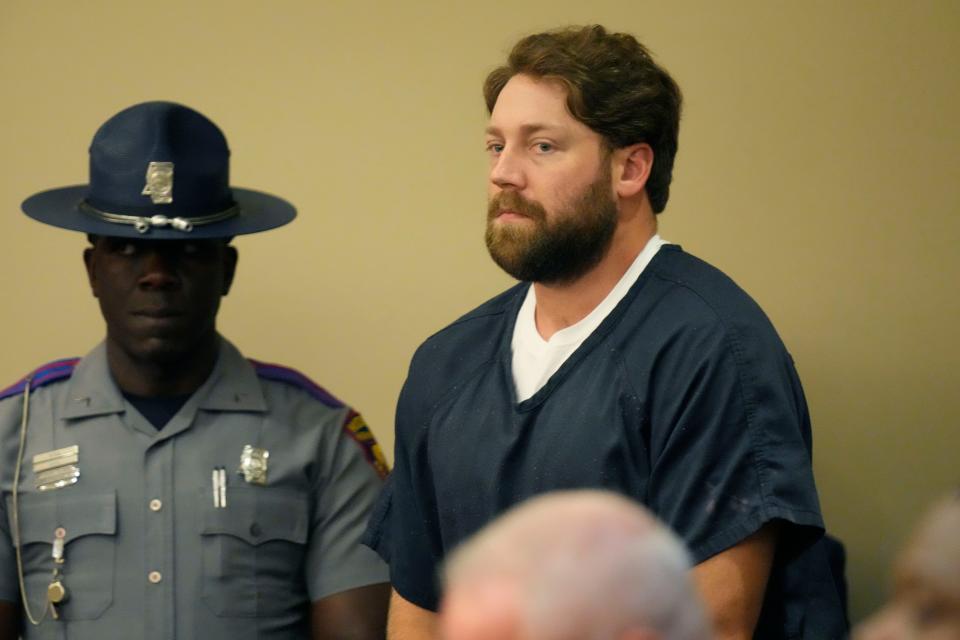 Former Rankin County sheriff’s deputy Hunter Elward, right, appears in the Rankin County Circuit Court in Brandon, Miss., Monday, Aug. 14, 2023. Elward is one of six white former Mississippi law officers that pleaded guilty to state charges on Monday for torturing two Black men in a racist assault. All six had recently admitted their guilt in a connected federal civil rights case.