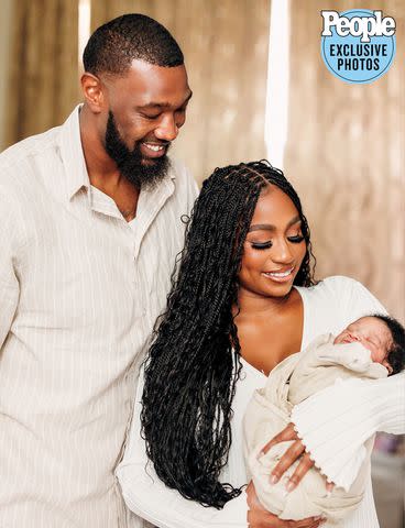 <p>Courtesy of The Jeffersons | Credit: Marrica Evans</p> Cory and JaLisa with son Cory II