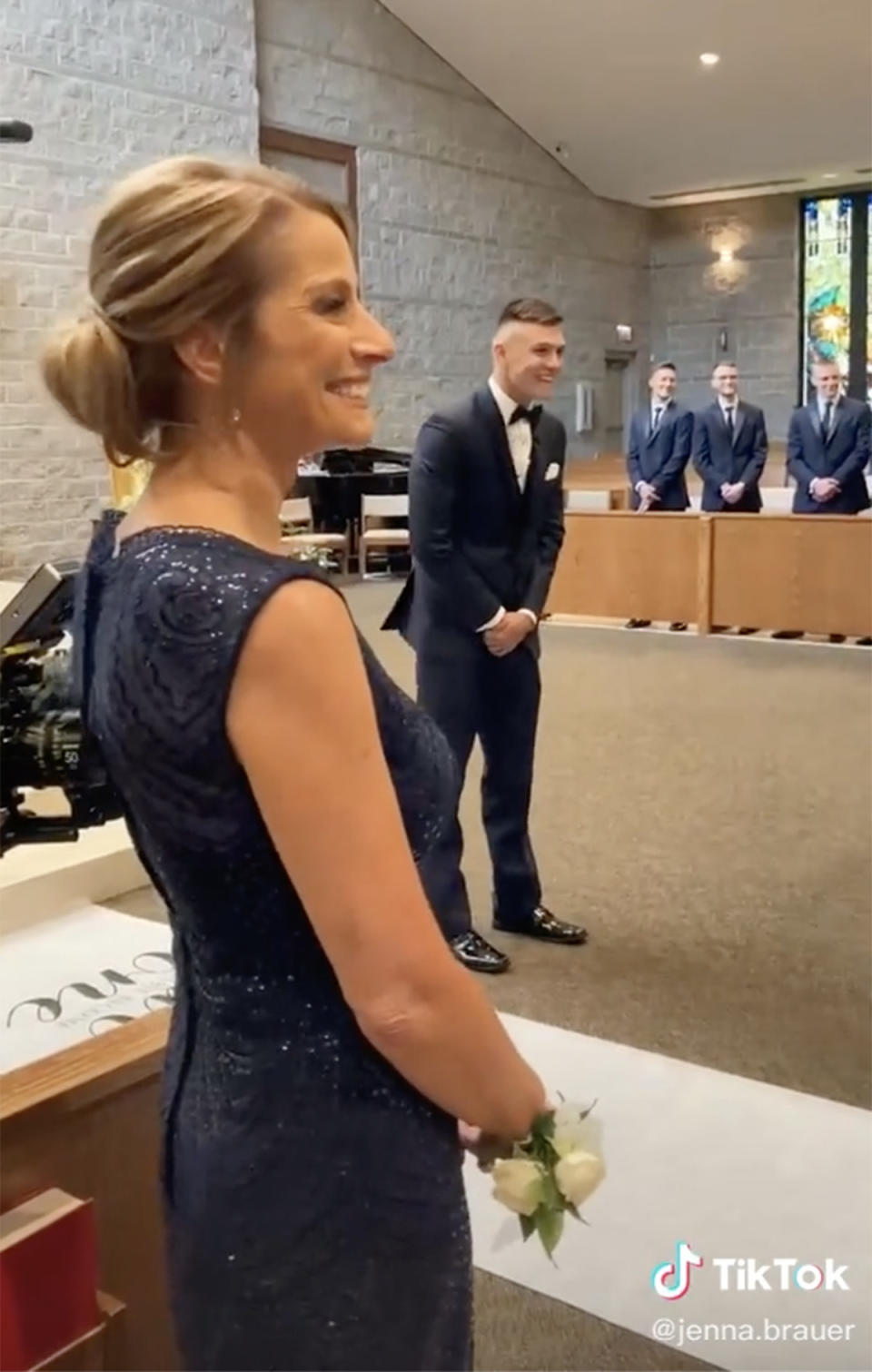 An excited groom waits for his bride at the altar on their wedding day. Photo: TikTok/jenna.smiley.