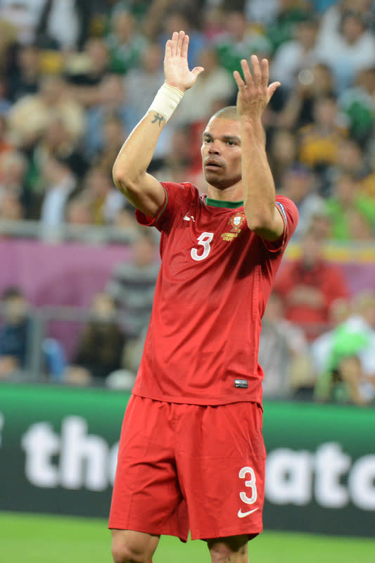 Portuguese defender Pepe applauds during the Euro 2012 championships football match Germany vs Portugal on June 9, 2012 at the Arena Lviv. AFP PHOTO / DAMIEN MEYERDAMIEN MEYER/AFP/GettyImages