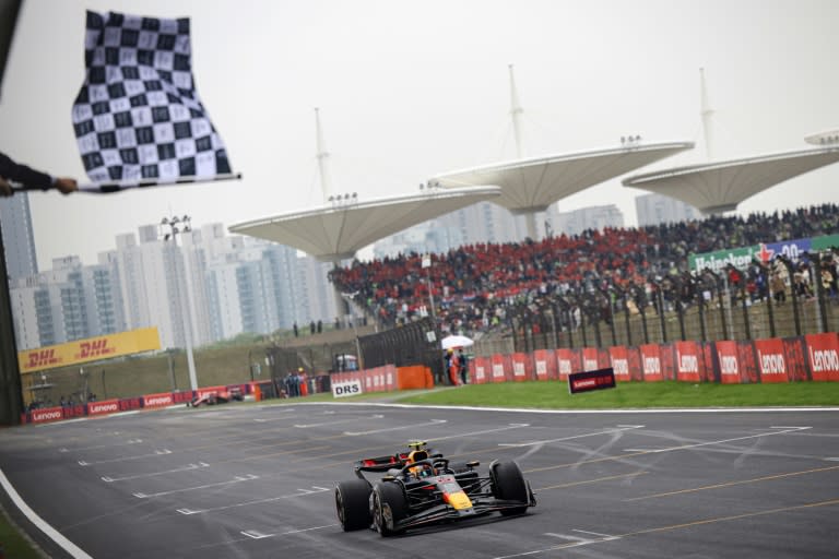 Max Verstappen takes the chequered flag to win the Chinese Grand Prix (Andres Martinez Casares)