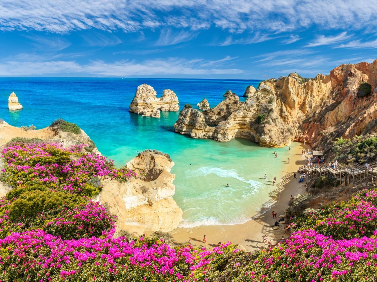 Praia do Camilo beach in Portugal, one of the ‘green list’ destinations (Getty Images/iStockphoto)