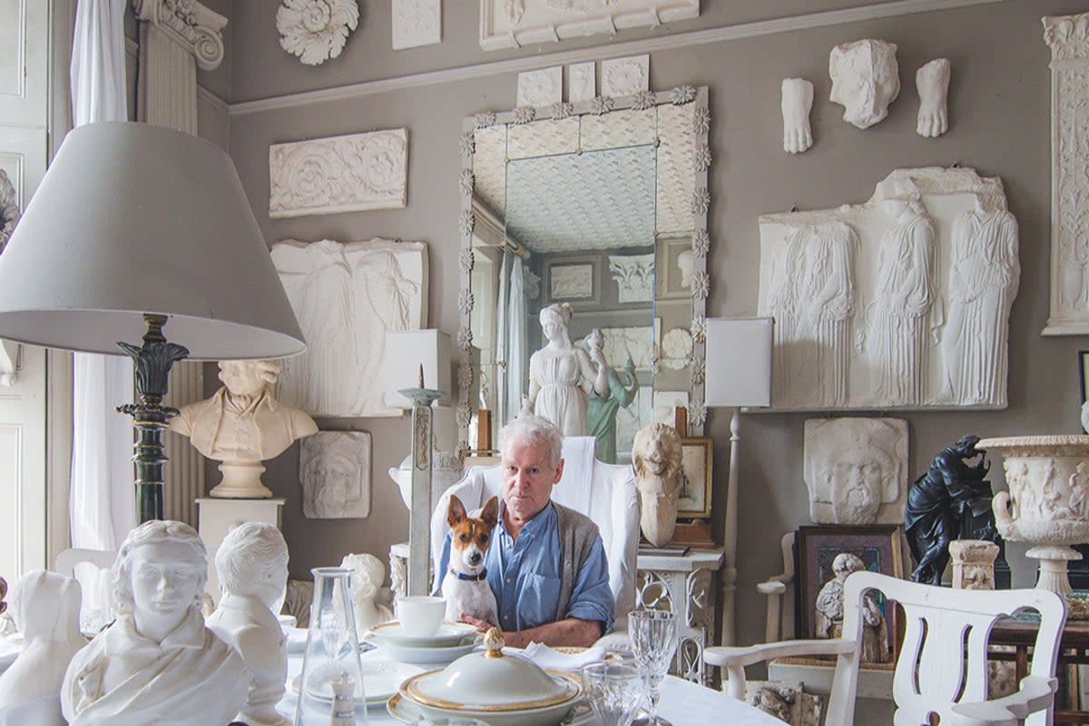 Hone and his dog, Bude, at his Notting Hill home (Lay’s Auctioneers)