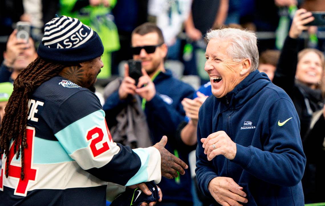 Former Seahawk running back Marshawn Lynch and head coach Pete Carroll share a laugh before the game against the Pittsburgh Steelers at Lumen Field, on Sunday, Dec. 31, 2023, in Seattle, Wash. Brian Hayes/bhayes@thenewstribune.com