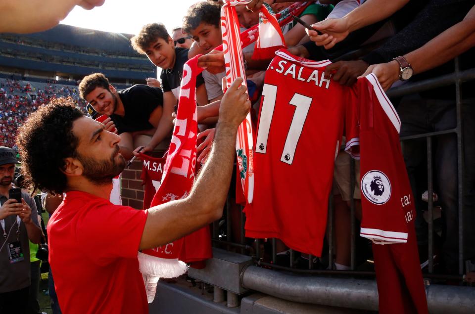 Mohamed Salah signs autographs after Liverpool’s 4-1 preseason win over Manchester United in the International Champions Cup. (Getty)