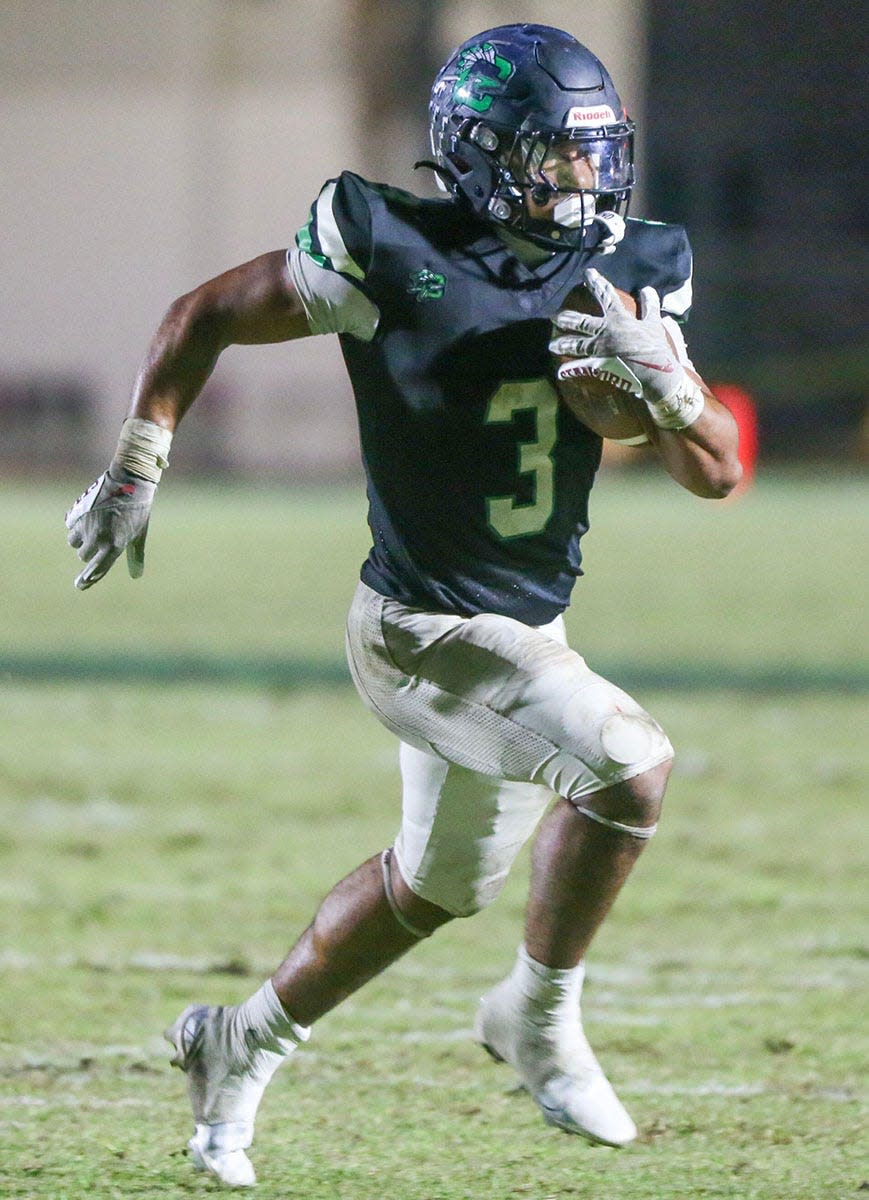 Choctaw RB Cole Tabb runs with the ball during the Choctaw Columbia regional quarterfinal playoff football game at Choctaw.