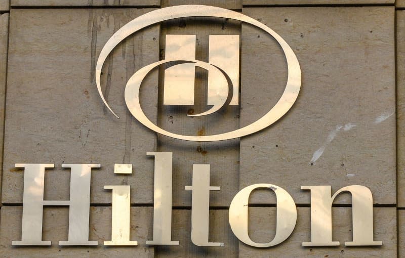 The Hilton lettering on the building of the hotel in Mohrenstrasse on Gendarmenmarkt. Hospitality company Hilton Worldwide Holdings announced Wednesday that it has acquired a majority controlling interest in Sydell Group, a creator of boutique lifestyle hotels. Jens Kalaene/dpa-Zentralbild/ZB