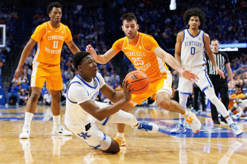 Kentucky guard Adou Thiero (3) goes to the floor with the ball during his team's 2023 game against Tennessee at Rupp Arena at Central Bank Center.