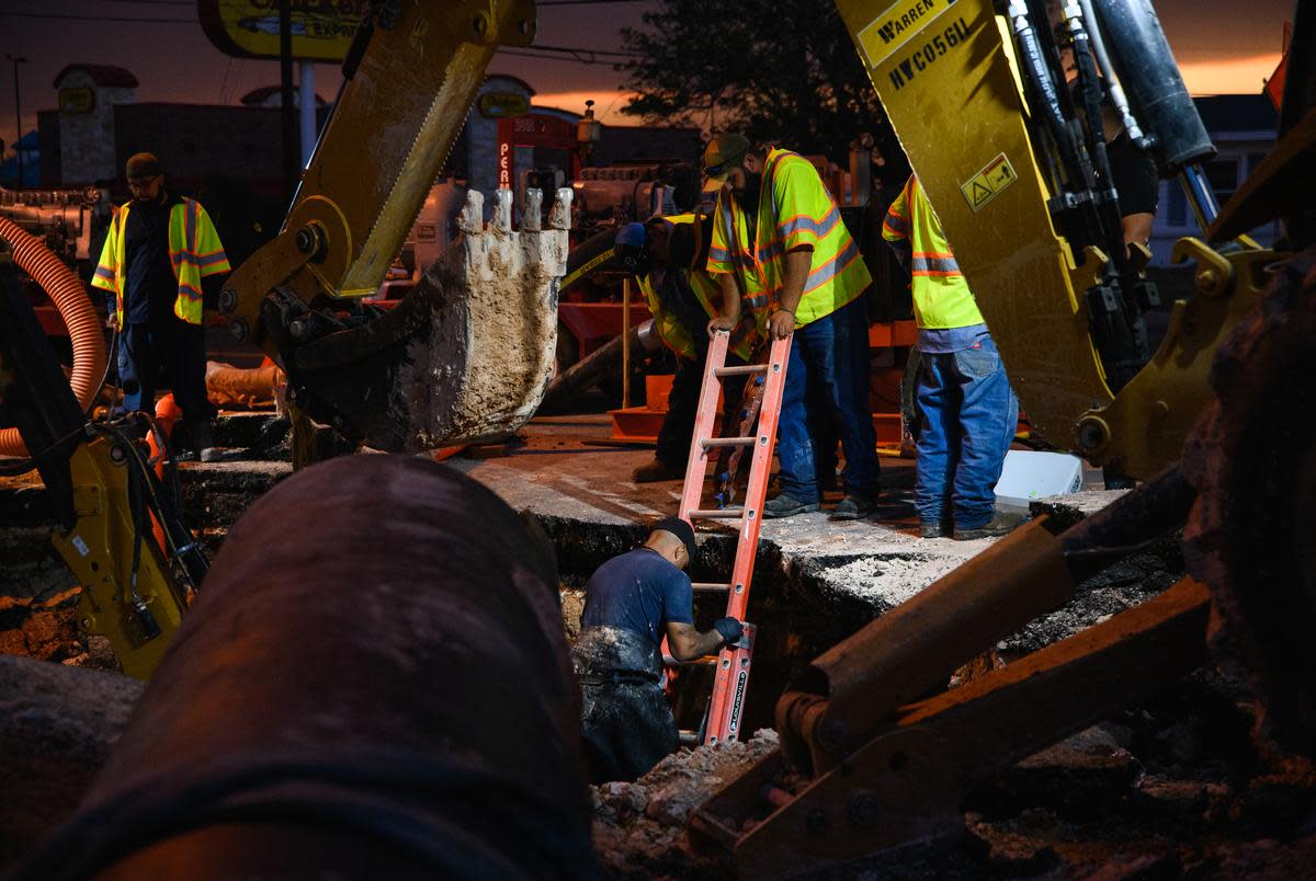 City of Odessa Water Distribution employees work through the night as they attempt to repair a broken water main Tuesday, June 14, 2022 in Odessa. According to Mayor of Odessa Javier Joven, repairs were completed around 3:45 a.m. Wednesday.