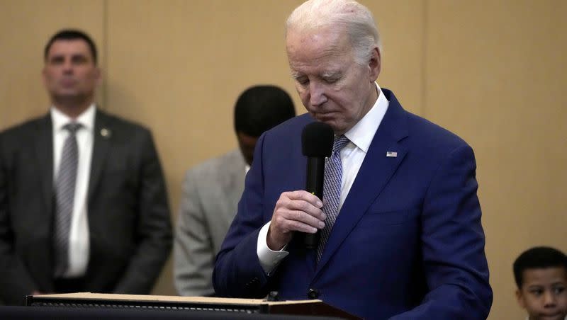 President Joe Biden bows his head in a moment of silence for the three American troops killed Sunday, Jan. 28, 2024, in a drone strike in northeast Jordan, while speaking at Brookland Baptist Church, in West Columbia, S.C.