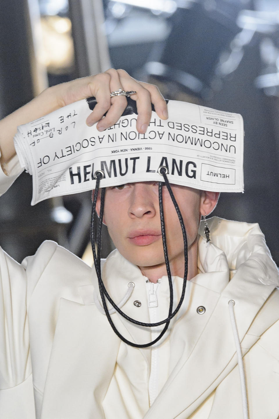 <p><i>Newspaper clutch from the SS18 Helmut Lang collection. (Photo: ImaxTree) </i></p>