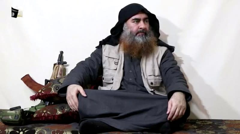 FILE PHOTO: Bearded man with IS leader al-Baghdadi's appearance speaks in this screen grab taken from video