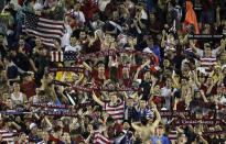 U.S. soccer fans celebrate their team's 3-1 win over Antigua and Barbuda during a FIFA World Cup qualifying soccer match Friday, June 8, 2012, in Tampa, Fla. (AP Photo/Chris O'Meara)