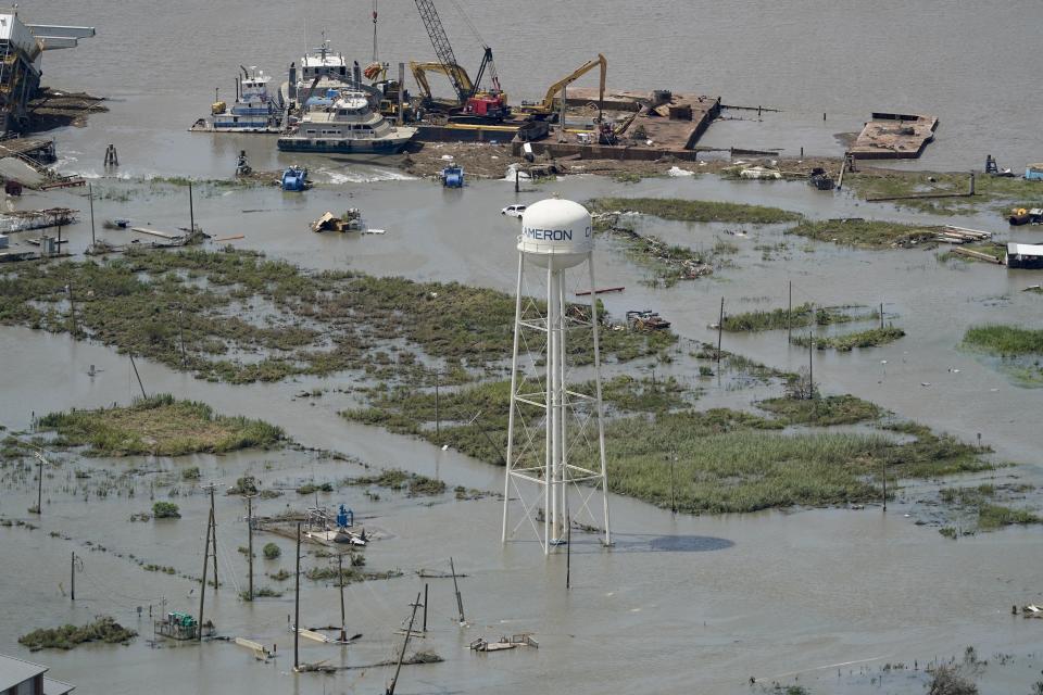 Buildings are flooded in the aftermath of Hurricane Laura Thursday, Aug. 27, 2020, near Lake Charles, La. (AP Photo/David J. Phillip)