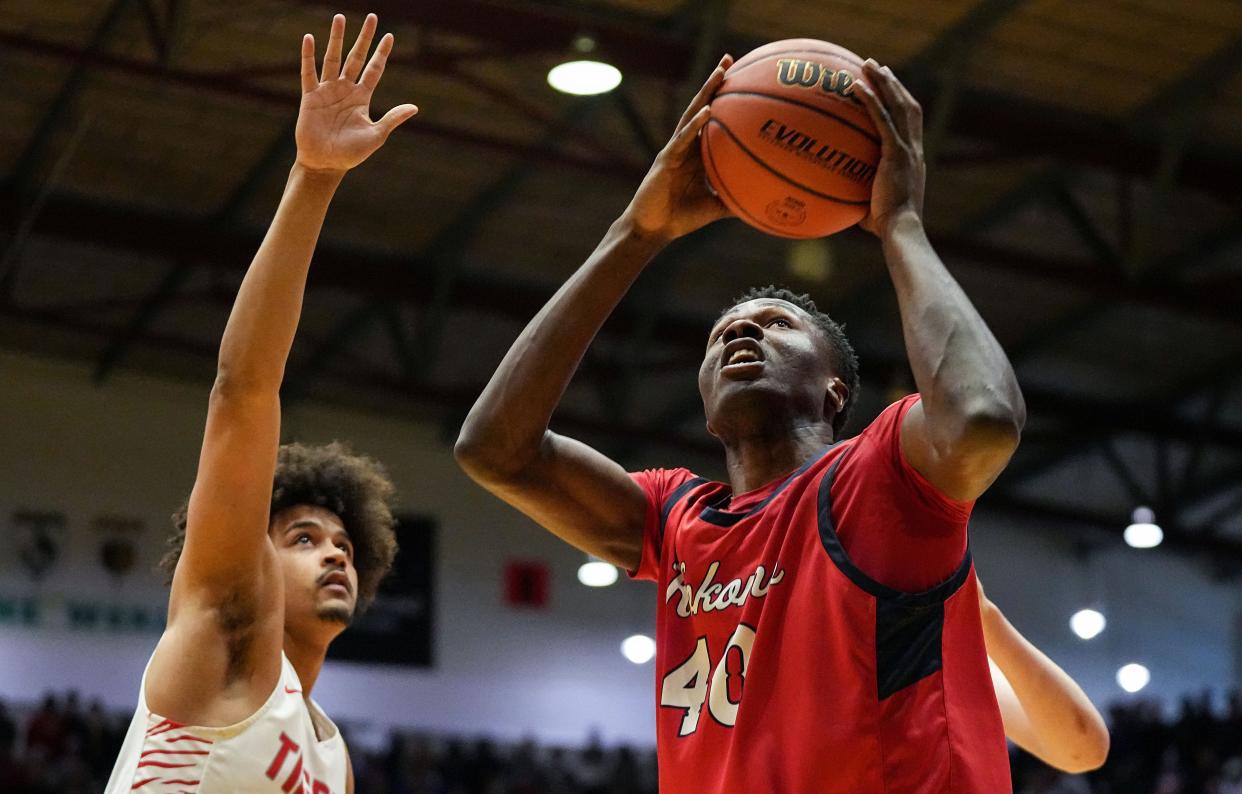 Kokomo Wildkats center Flory Bidunga (40) goes in for a lay-up Saturday, March 9, 2024, during the IHSAA boys basketball regional final at the New Castle Fieldhouse in New Castle. The Fishers Tigers defeated the Kokomo Wildkats, 66-52.